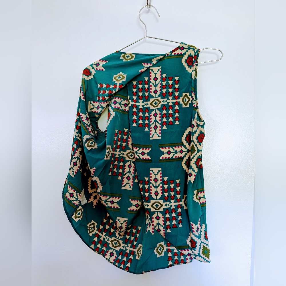 Moa Moa flowy, sleeveless, green top with beautiful print